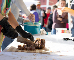 Chopping meat at Pensacola Eggfest