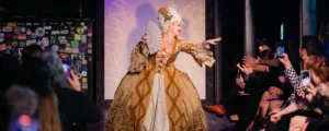 Opera performer dressed in colonial attire for rock the runway in pensacola, fl